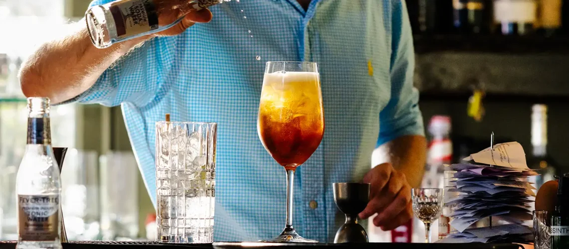 Barman making a drink